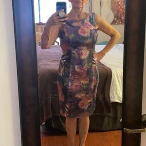 Sequins zipper up dress. Form fitting.
